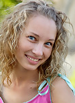 Adorable blonde teen fooling around with no panties on